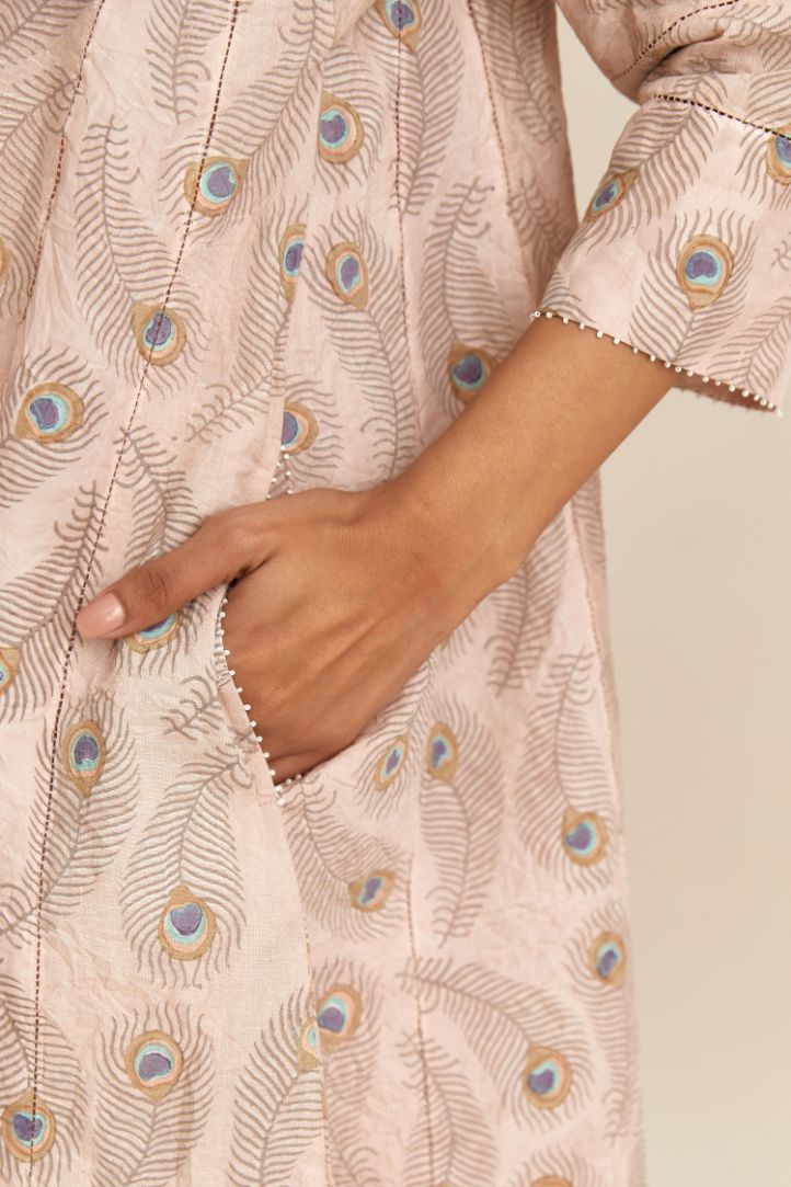 Hand block printed short kalidar kurta set in silk chanderi, highlighted with faggoting at side panels.