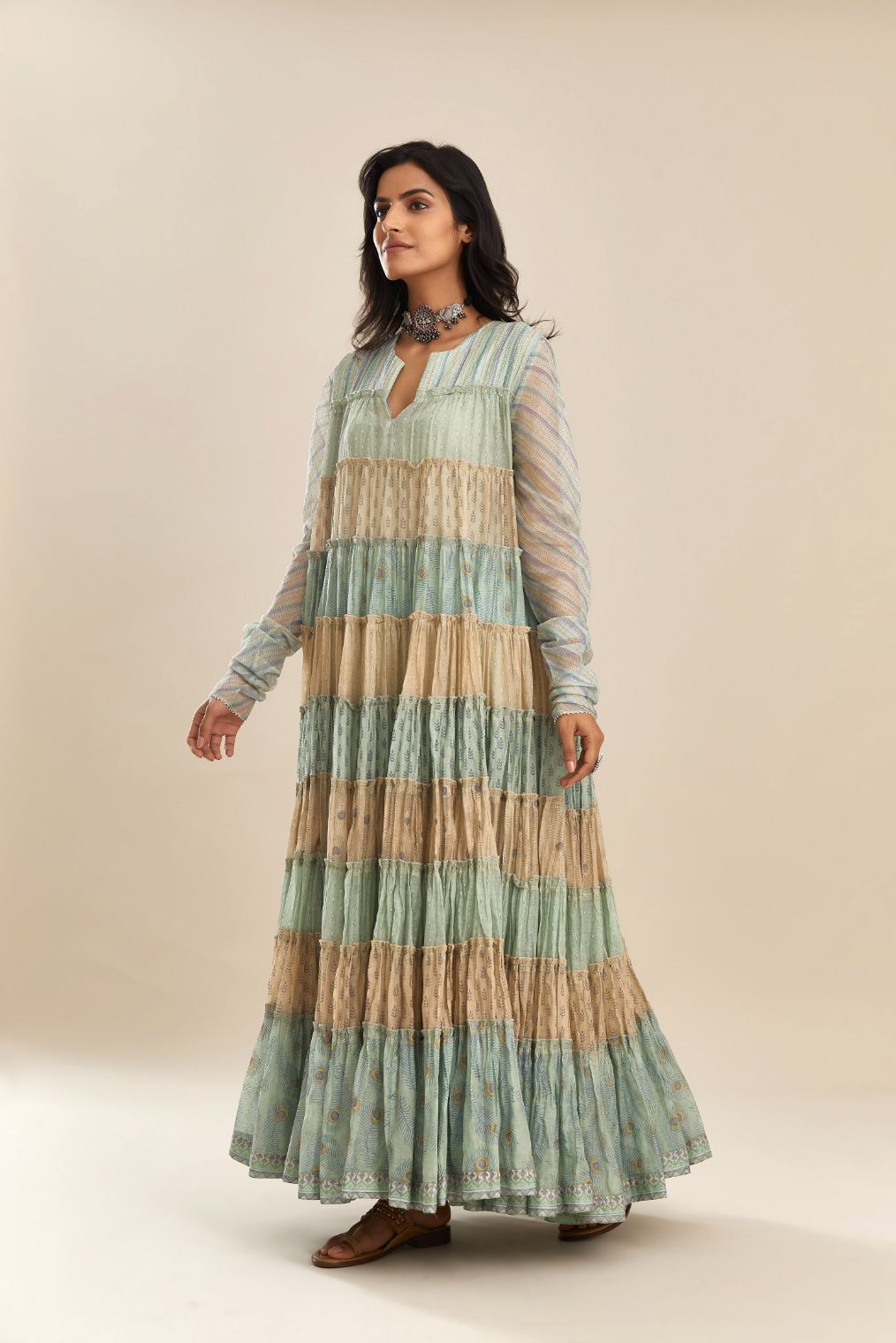 Hand block printed multi-tiered kurta dress set with churi sleeves and bead handwork detailing at neck and sleeves.