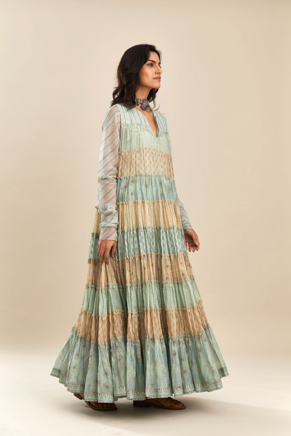 Hand block printed multi-tiered kurta dress set with churi sleeves and bead handwork detailing at neck and sleeves.
