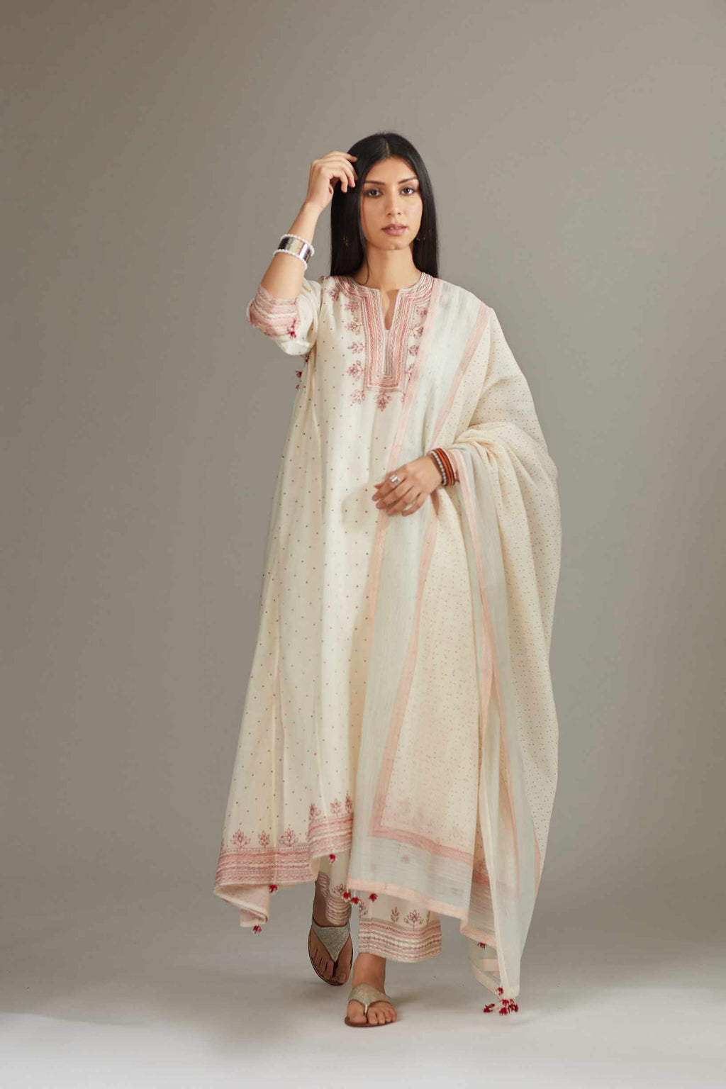 Asymmetric hand block printed kurta set with contrast quilted embroidery