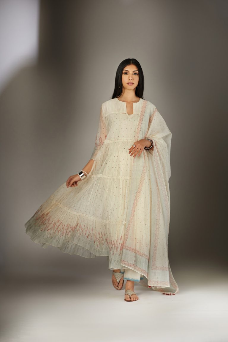 Multi-tiered hand block printed kurta set detailed with an all-over quilted and printed yoke