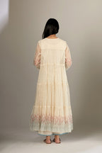Multi-tiered hand block printed kurta set detailed with an all-over quilted and printed yoke