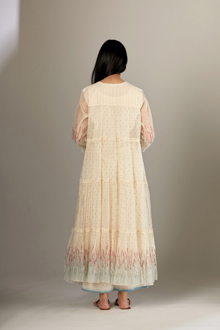 Multi-tiered hand block printed kurta set detailed with an all-over quilted and printed yoke