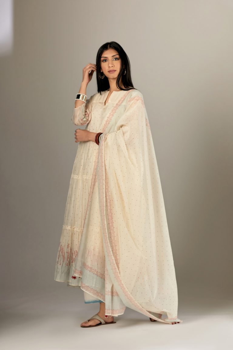 Multi-tiered hand block printed kurta set detailed with an all-over quilted and printed yoke