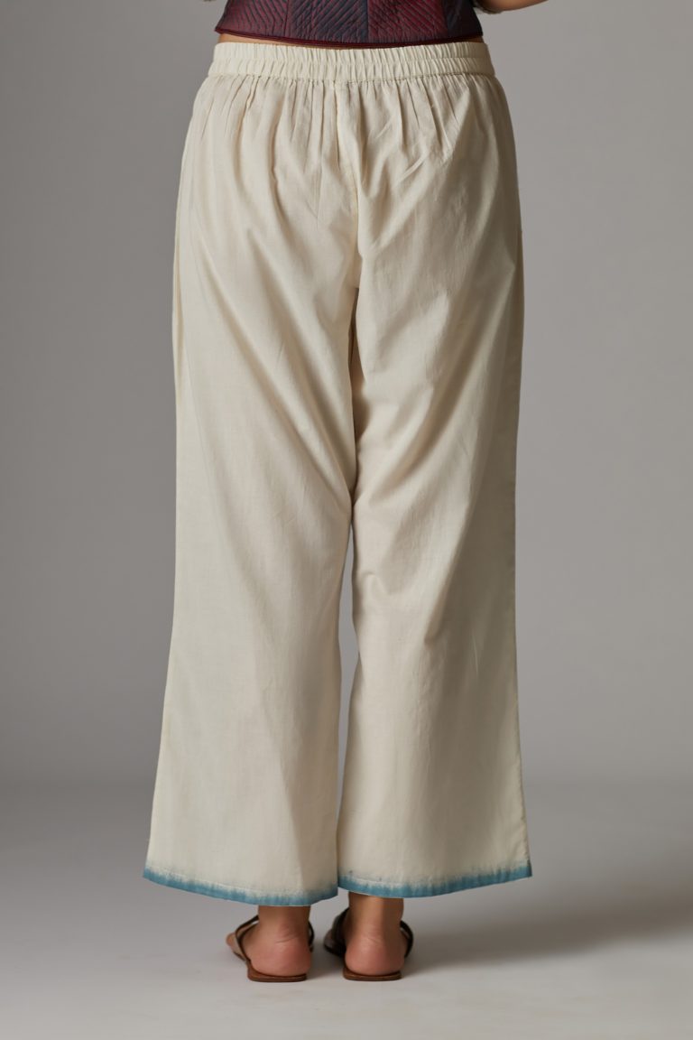 Off white straight pant with hand block print at the bottom