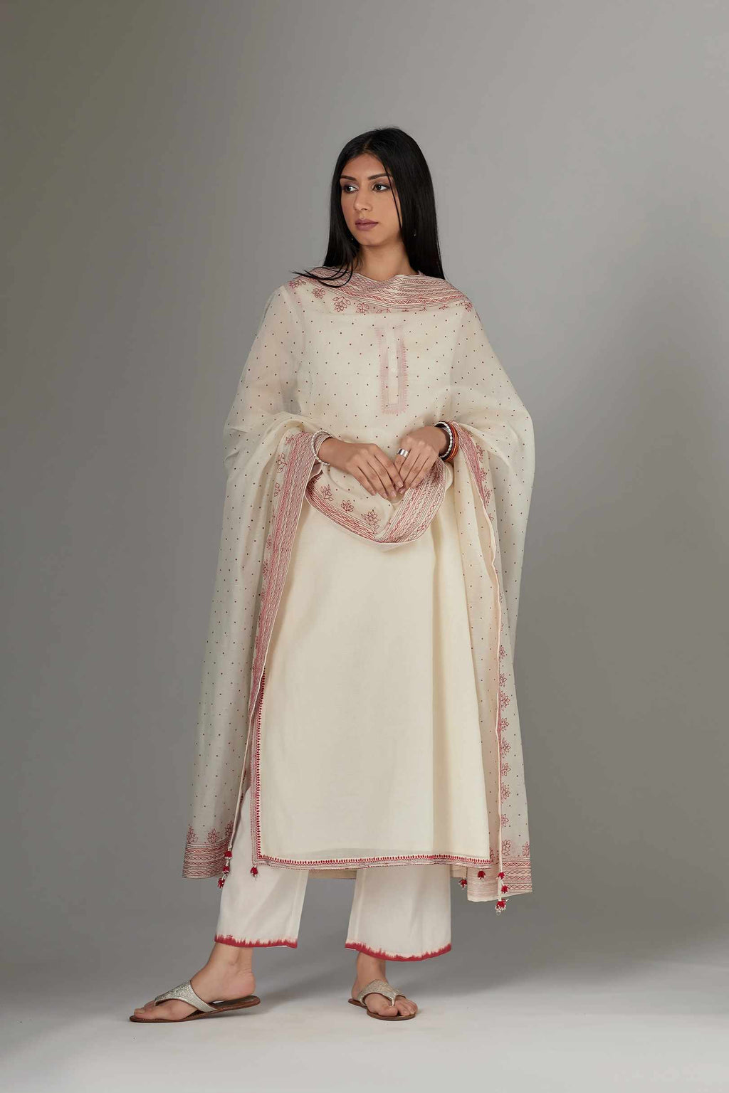 Straight Kurta set detailed with fine contrast thread embroidery