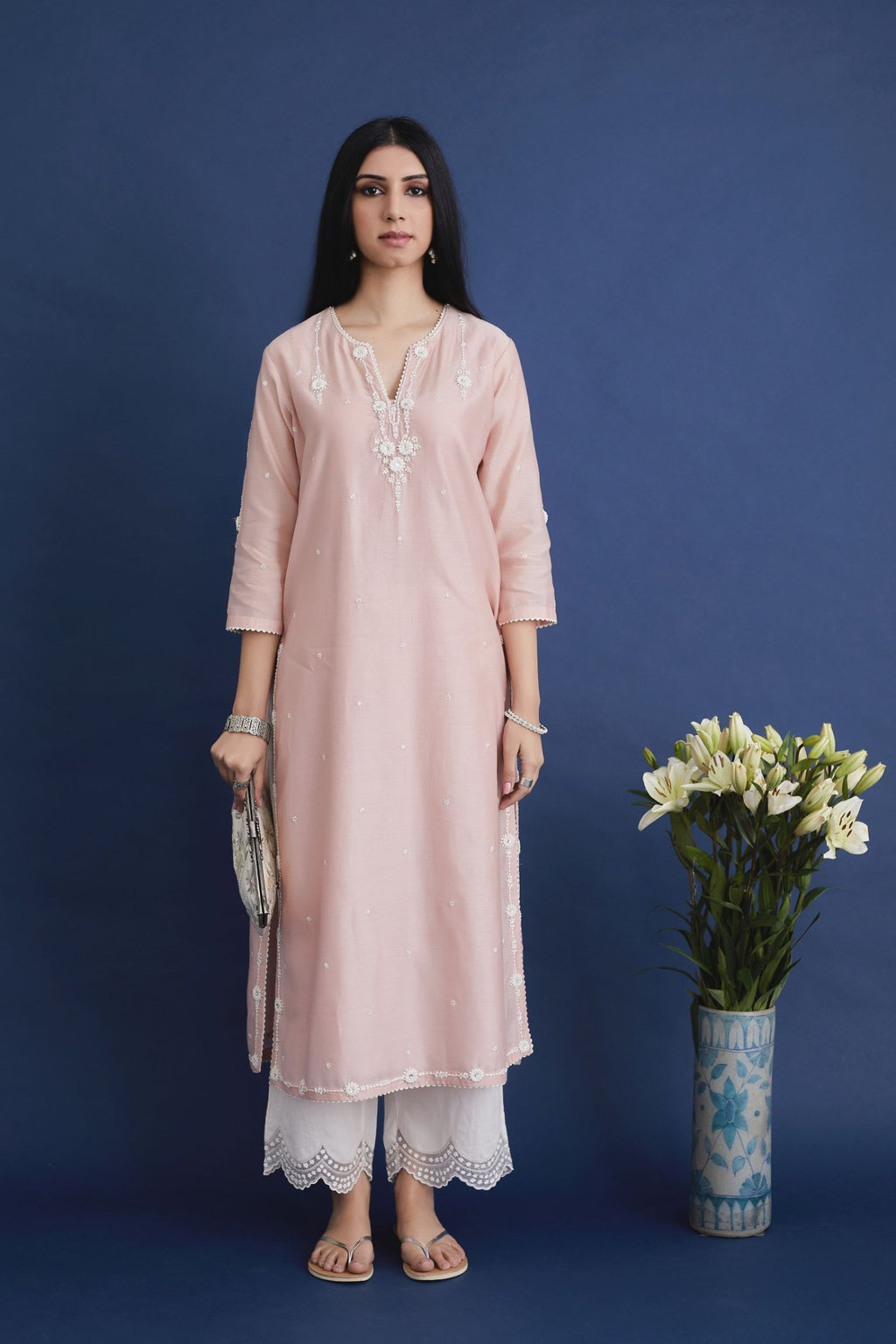 Silk chanderi straight kurta set with all-over contrast thread embroidery, highlighted with sequins hand work