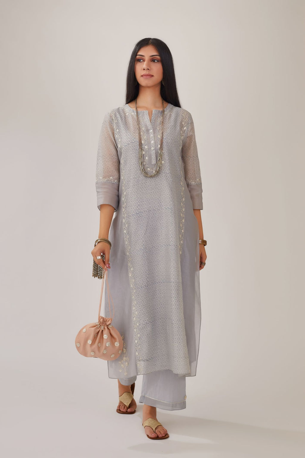 Steel blue hand block printed silk chanderi kurta with gota embroidery and plain side panels, paired with steel blue straight pants with gota and silk chanderi fabric detaling at bottom hem