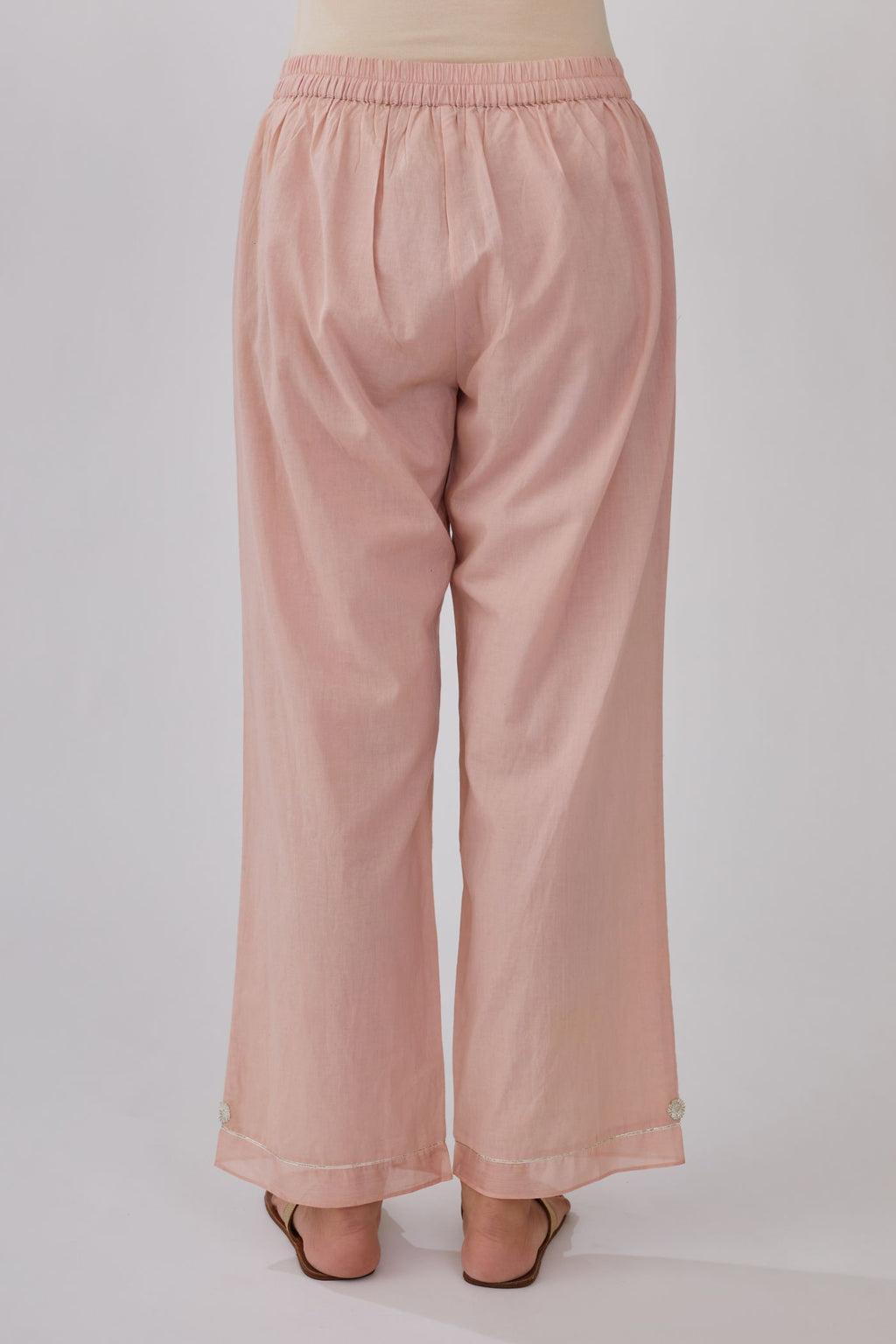 Pink straight pants with gota and silk chanderi fabric detaling at bottom hem