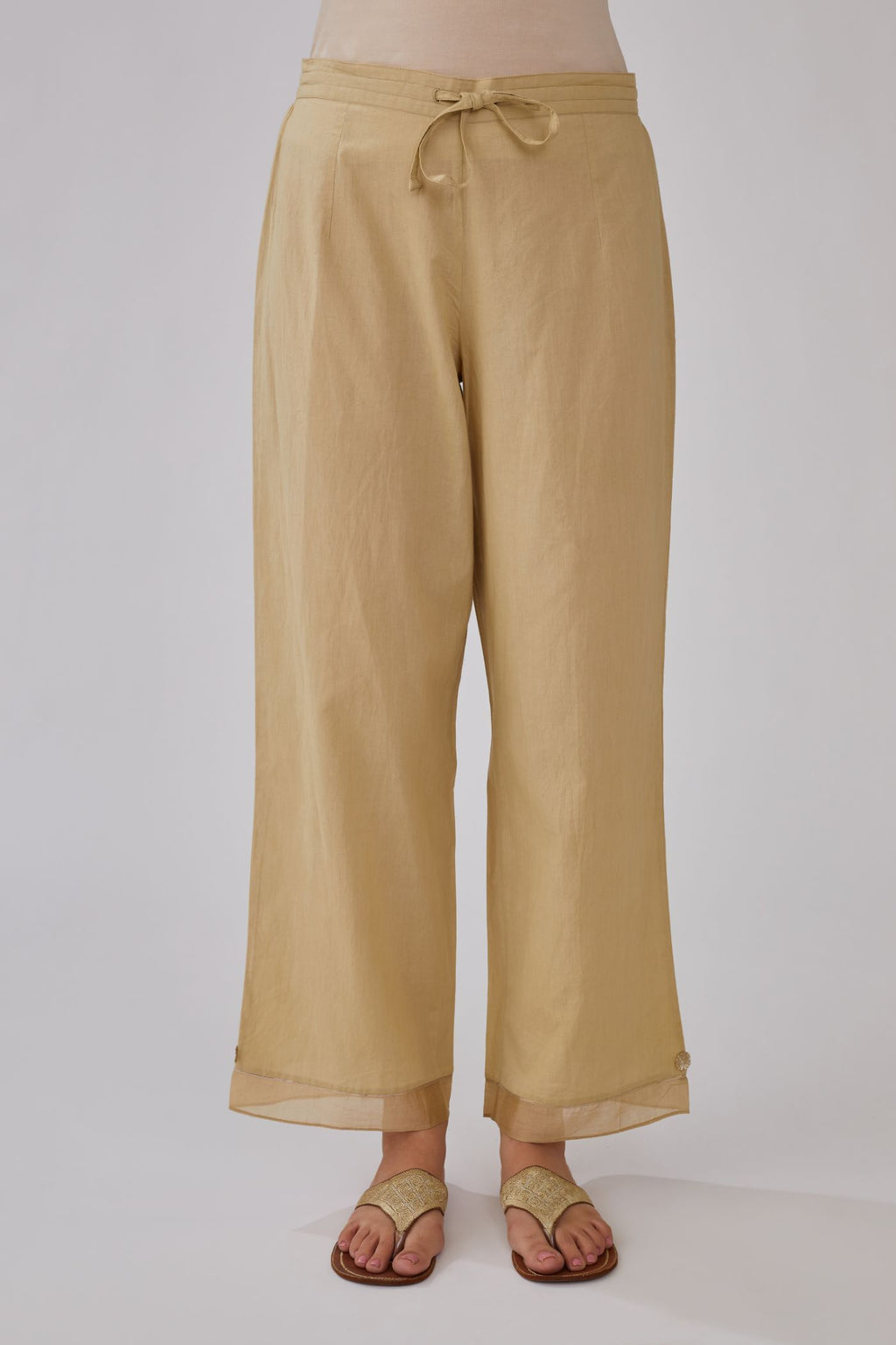 Olive straight pants with gota and silk chanderi fabric detaling at bottom hem