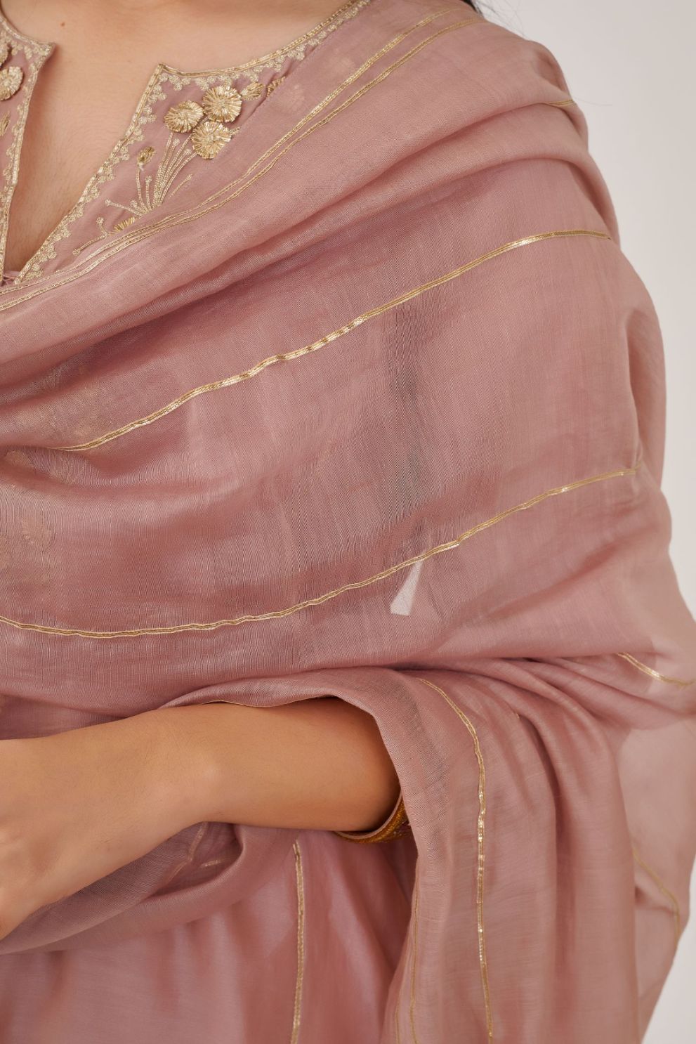 Lilac cotton chanderi dupatta highlighted with all-over gota work