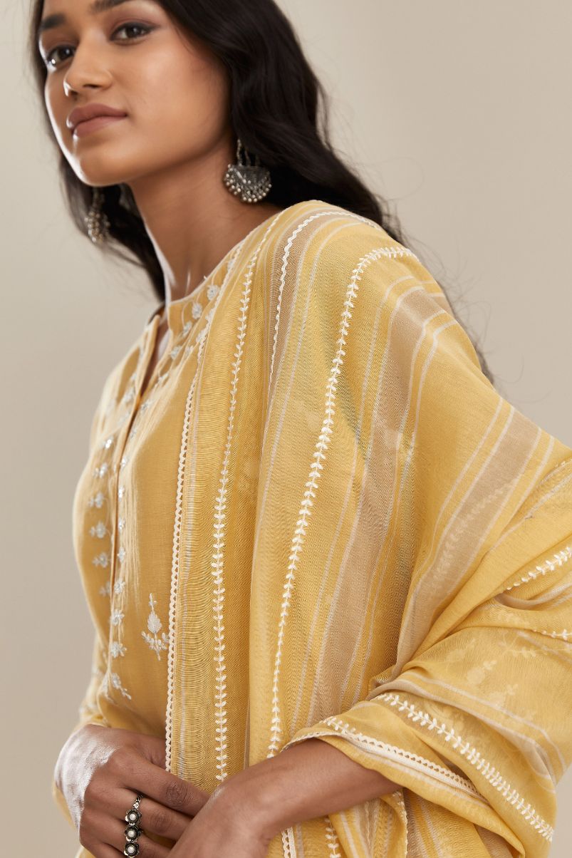 Yellow cotton chanderi short kalidar kurta set, with off white silk thread embroidery, highlighted with hand attached sequin and beads. (Kurta+Slip+Salwar+Dupatta)
