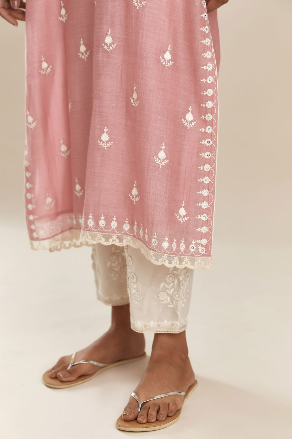 Pink cotton chanderi straight kurta set with all-over off white silk thread embroidery, highlighted with hand attached sequin and beads.