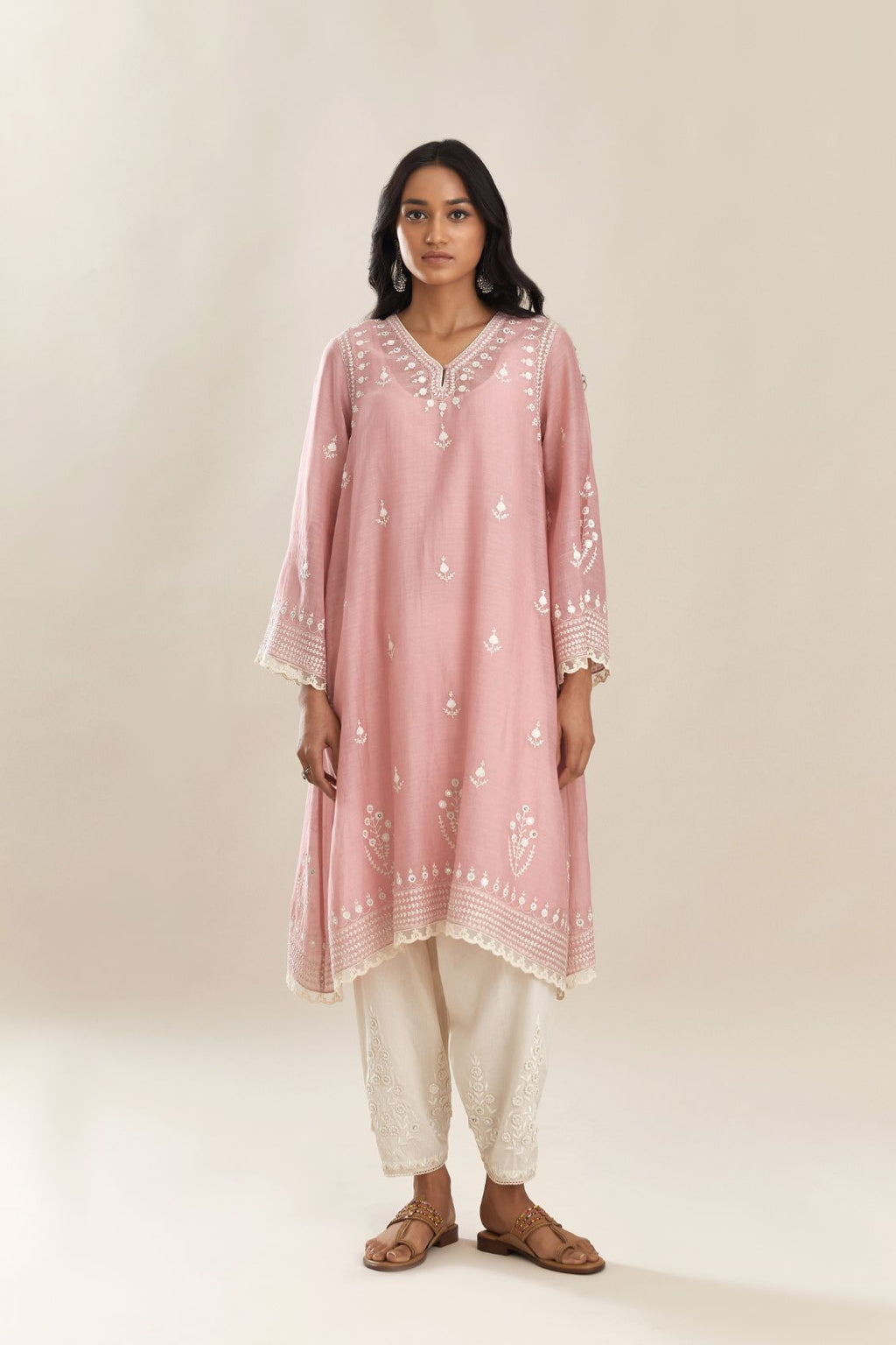 Cotton chanderi easy fit shortV neck kurta set with contrast off white silk thread embroidery, highlighted with hand attached sequin and beads.