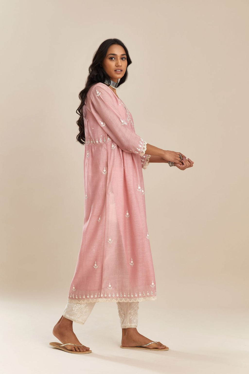 Pink cotton chanderi kurta set with off white silk thread embroidery and cotton slip inside, highlighted with hand attached sequin and beads.