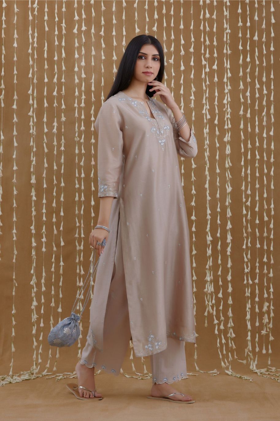 Silk Chanderi straight kurta set detailed with silver zari and contrasting thread embroidery