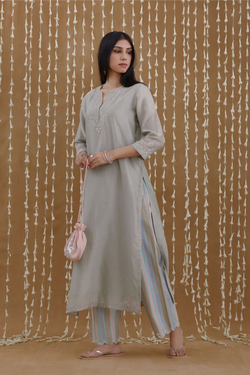 Silk Chanderi straight kurta set detailed with silver zari and contrasting thread embroidery