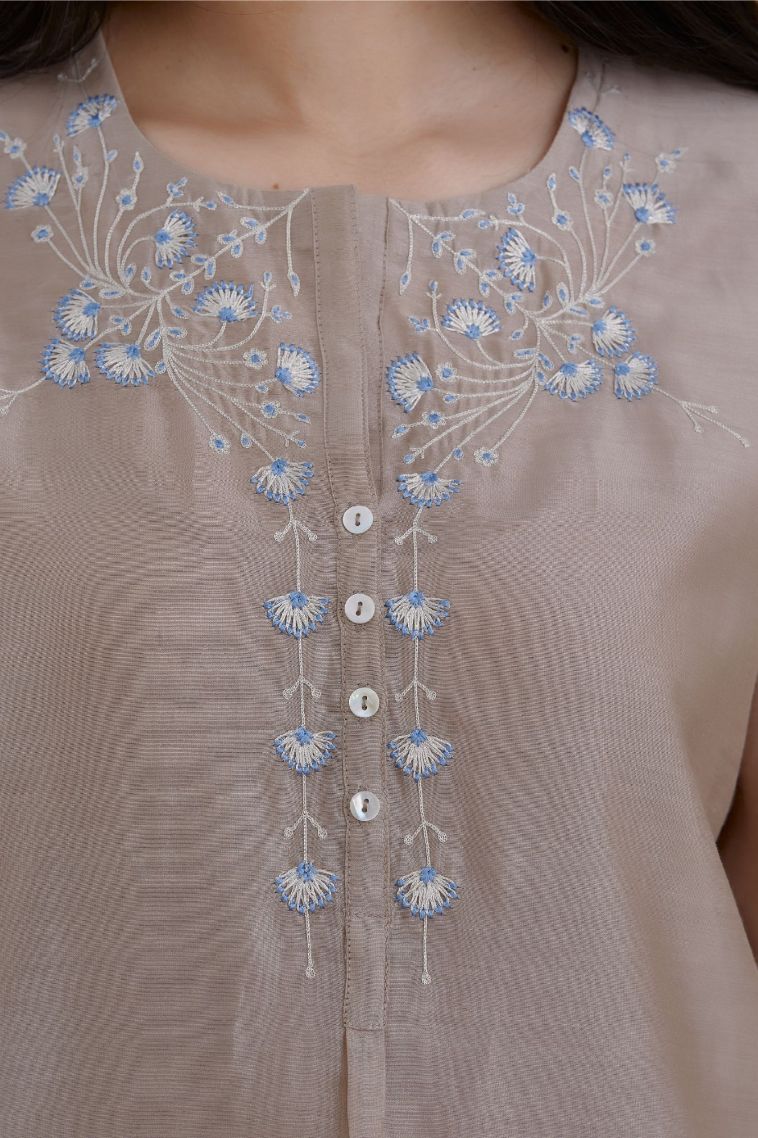 Silk Chanderi kurta set with silver zari and contrasting thread embroidery, hem and sleeves highlighted with zari faggoting