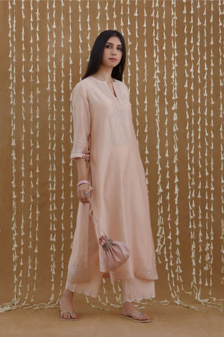 Peach silk Chanderi straight kurta set with zari and contrasting thread embroidery, highlighted with silver zari quilting
