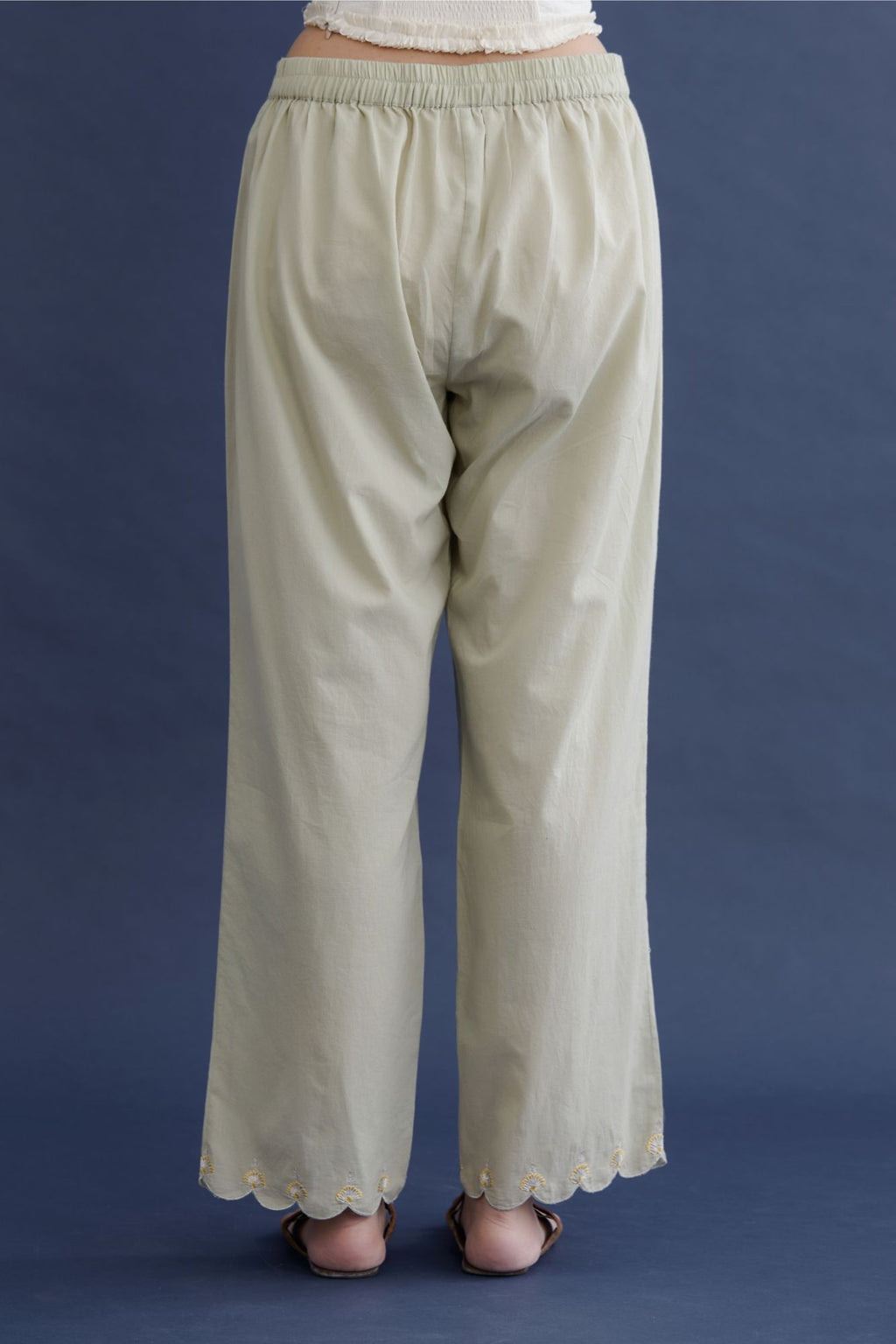 Cotton straight pants with scalloped zari and contrast coloured thread embroidered bottom hem