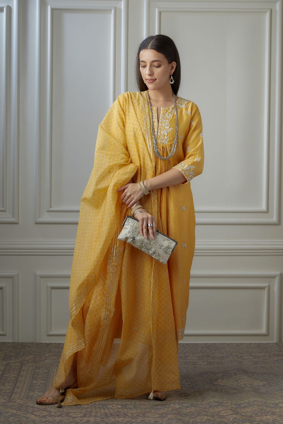 Golden yellow silver zari embroidered kurta dress set with fine gathers at waistline