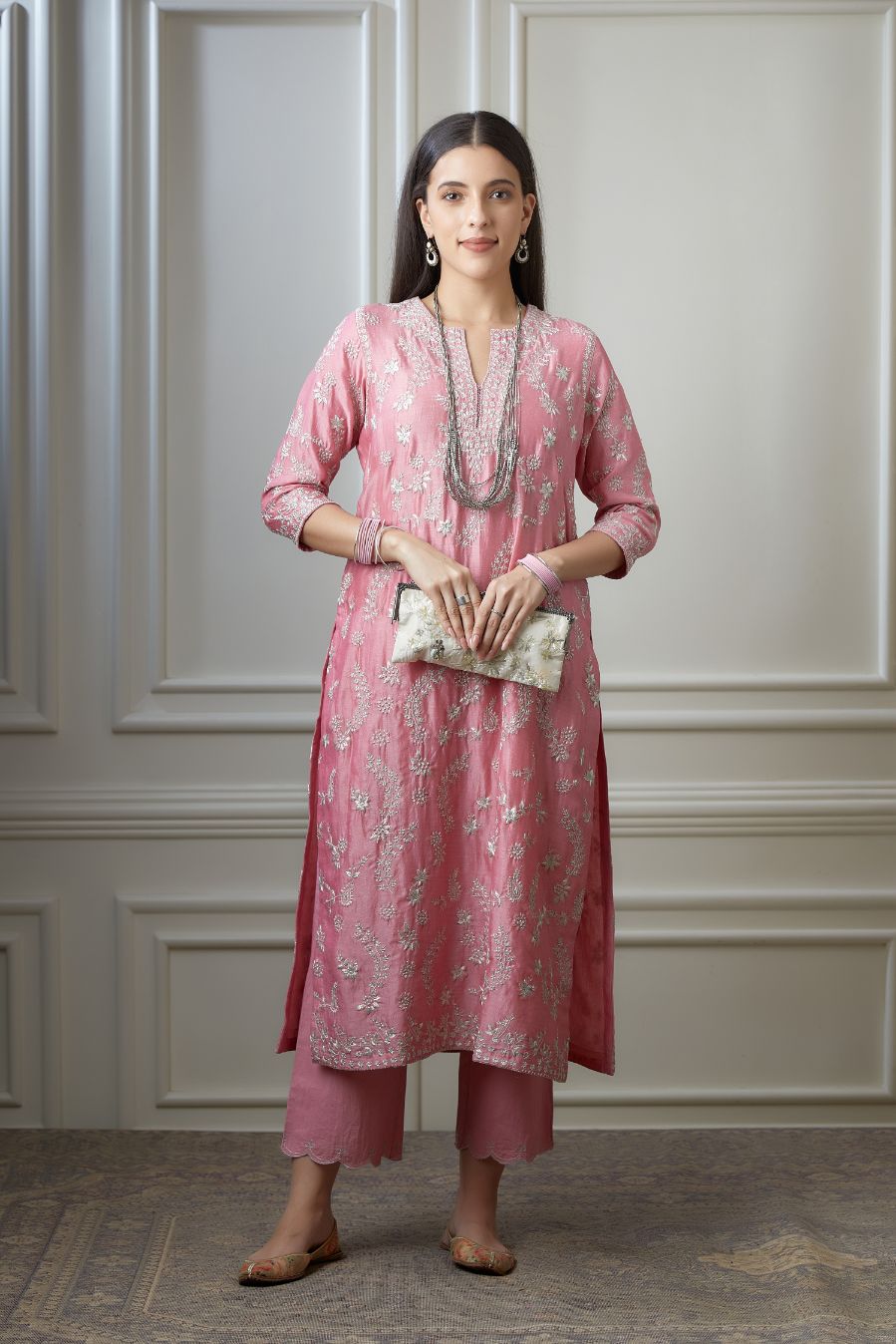 Lotus pink straight kurta set with all-over silver zari embroidery and round neck with slit in front