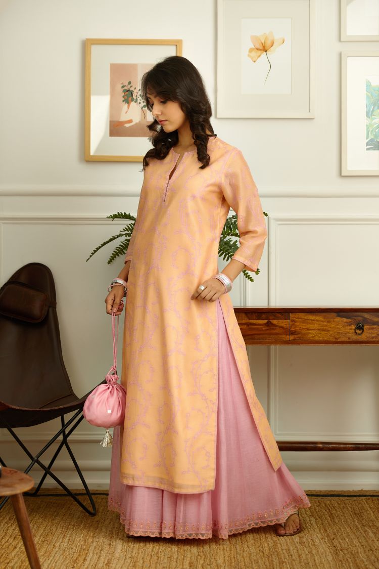Peach Silk chanderi straight kurta set with all-over pink contrast silk thread embroidery.