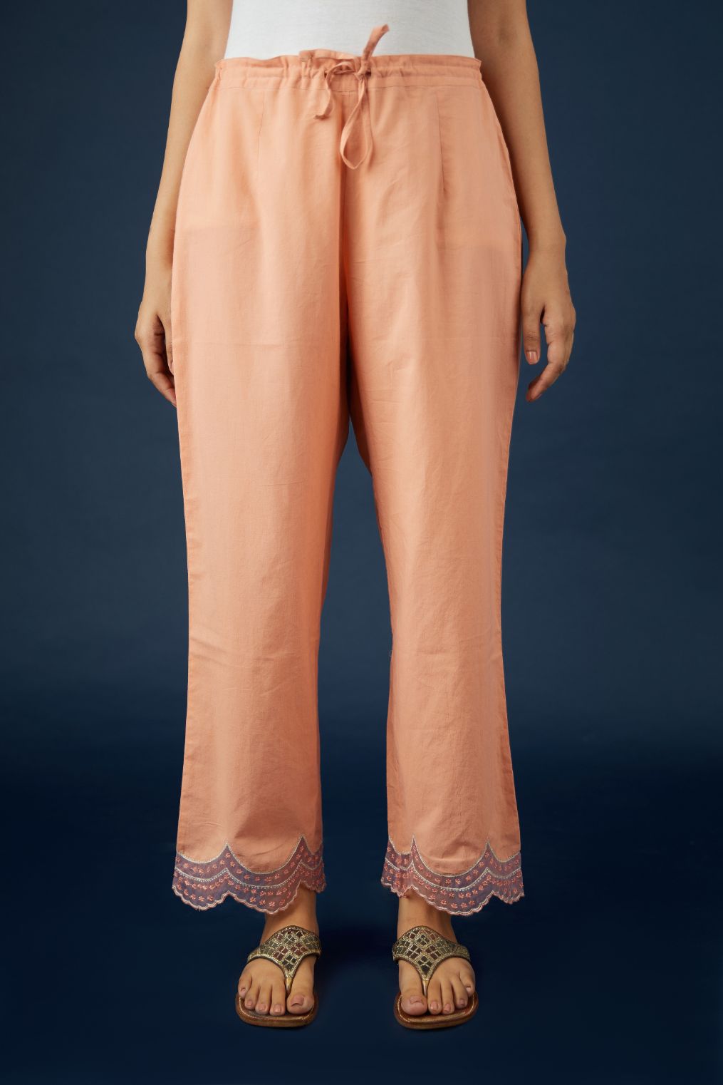 Straight pants with scalloped embroidery at hem. (Pants) – Kora India