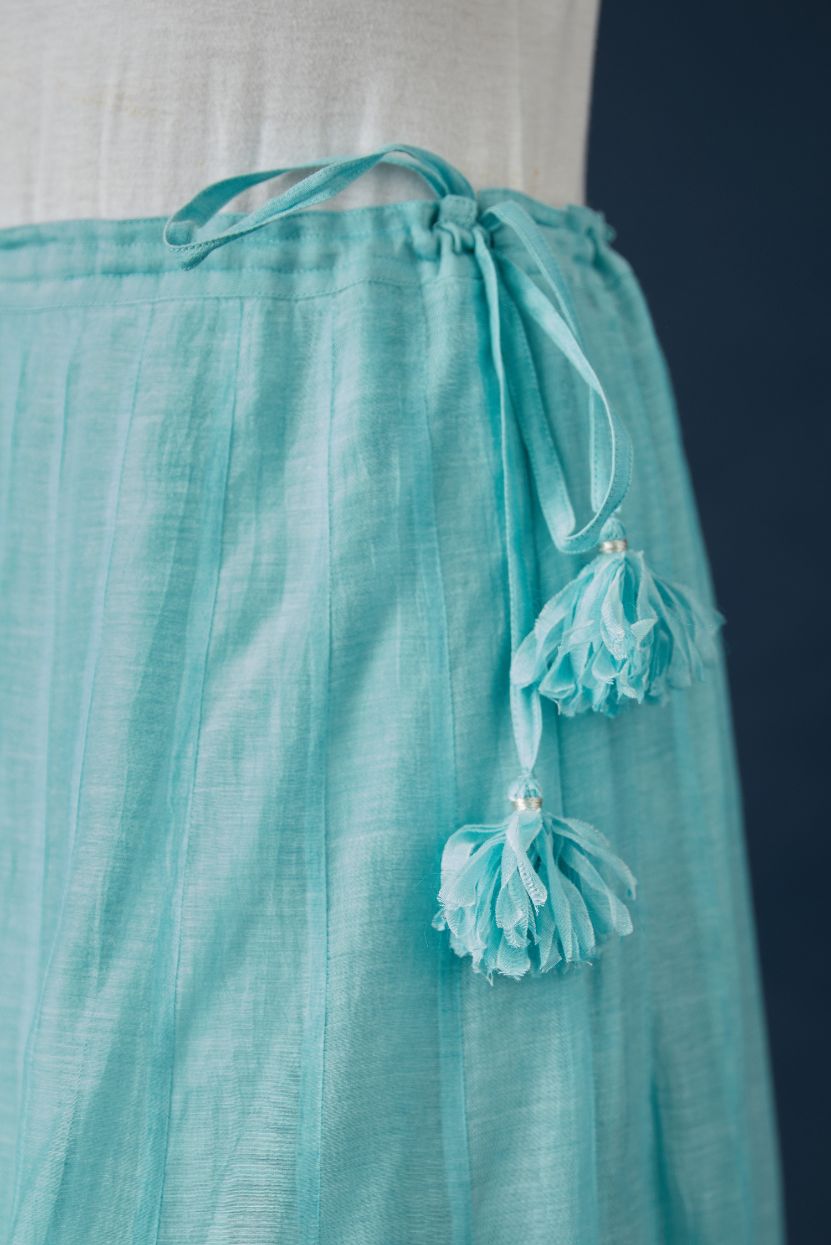 Aqua blue cotton Chanderi multi panelled skirt with lace, embroidery and sequin hand work detailing at edge. (Skirt)