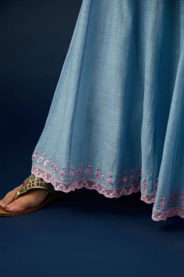 Blue cotton Chanderi multi panelled skirt with lace, embroidery and sequin hand work detailing at edge. (Skirt)