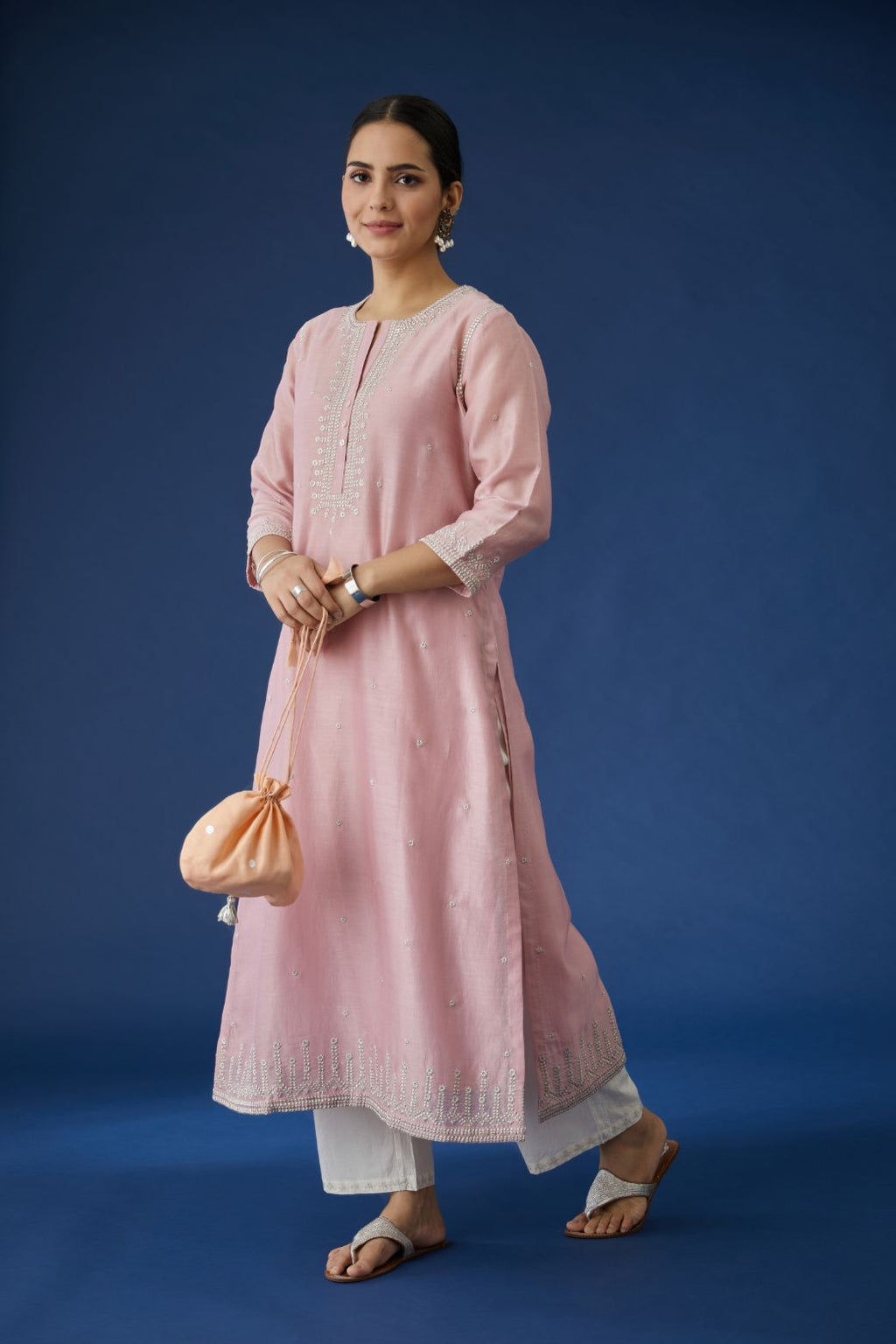 Pink silk chanderi straight kurta set, detailed with all-over silver zari embroidery.