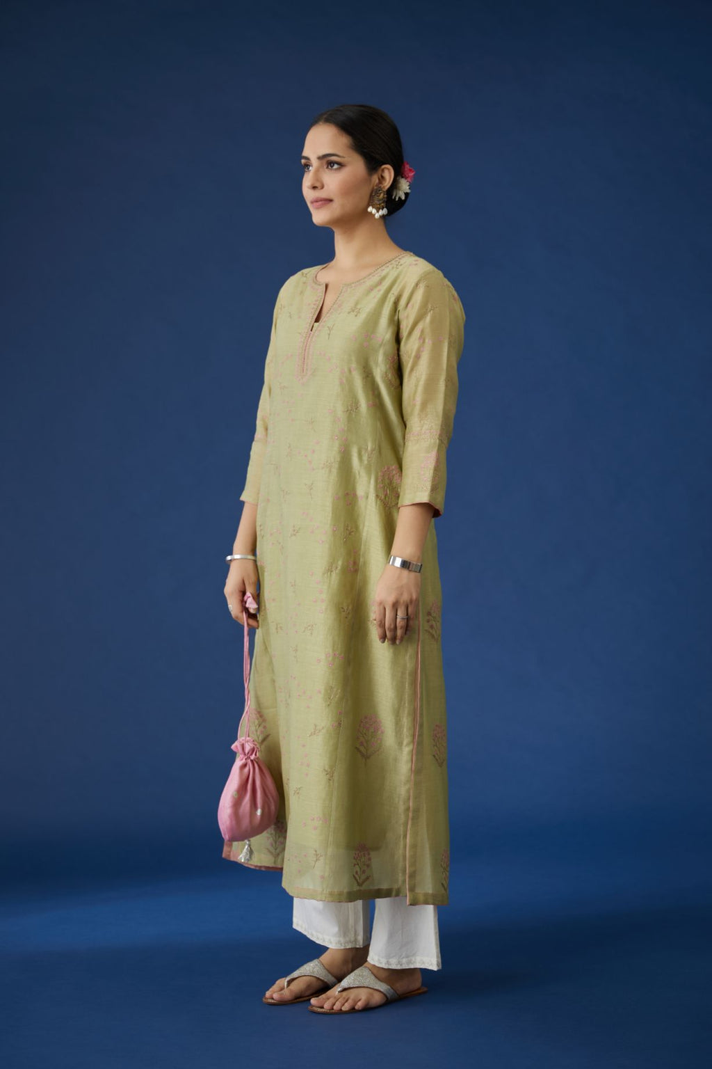 Henna green silk chanderi kurta set, detailed with all-over contrast silk thread and zari embroidery.