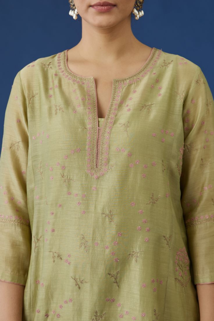 Henna green silk chanderi kurta set, detailed with all-over contrast silk thread and zari embroidery.