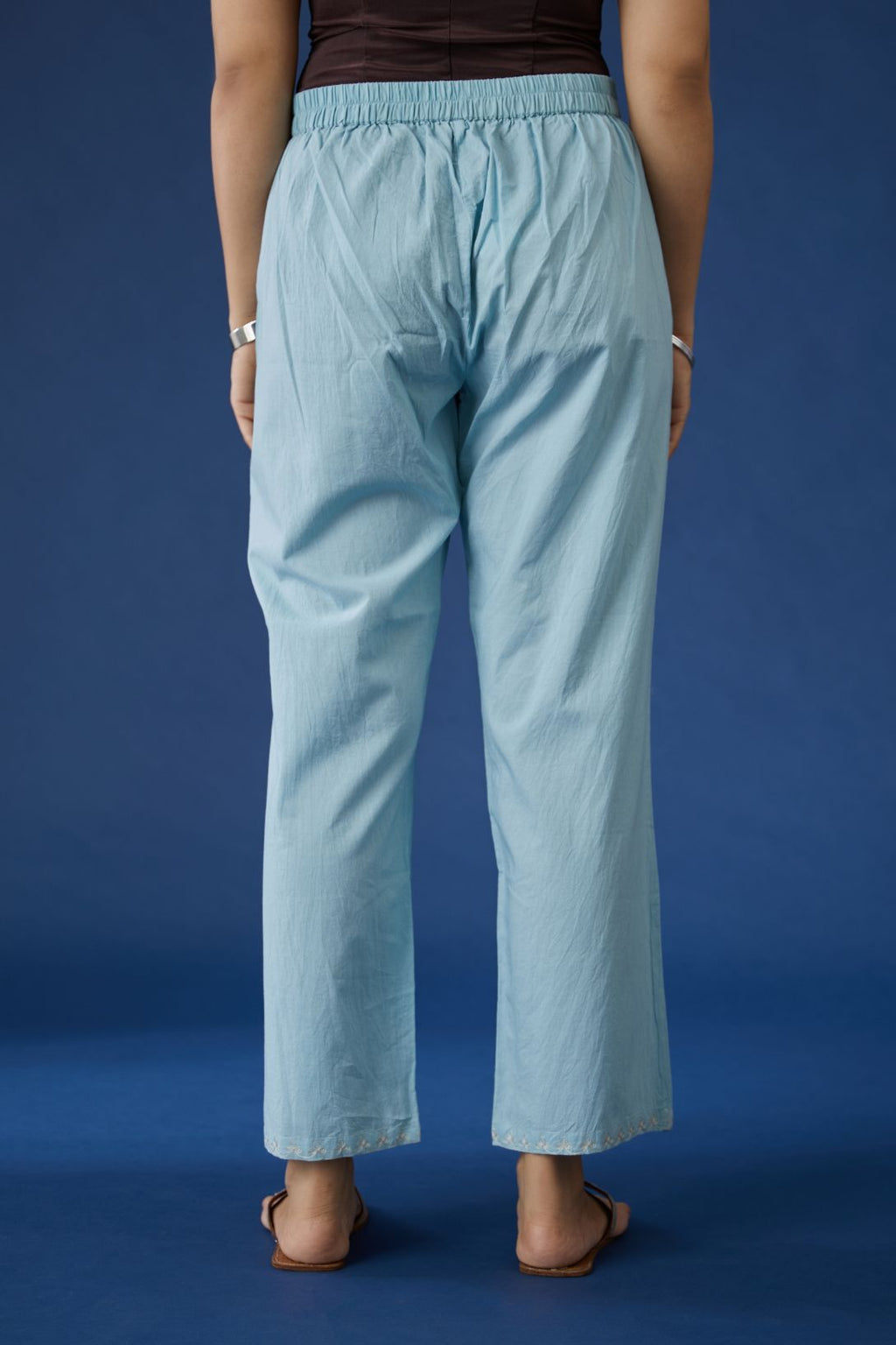 Baby blue cotton straight pants with silver zari embroidery at bottom hem (Pants)