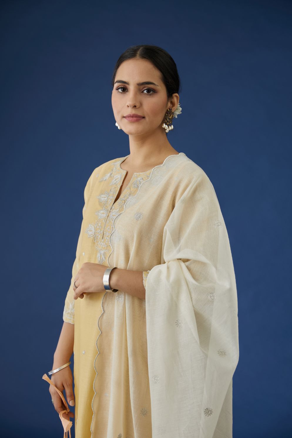 Off white cotton Chanderi dupatta with all-over silver zari embroidery and scalloped edges (Dupatta)