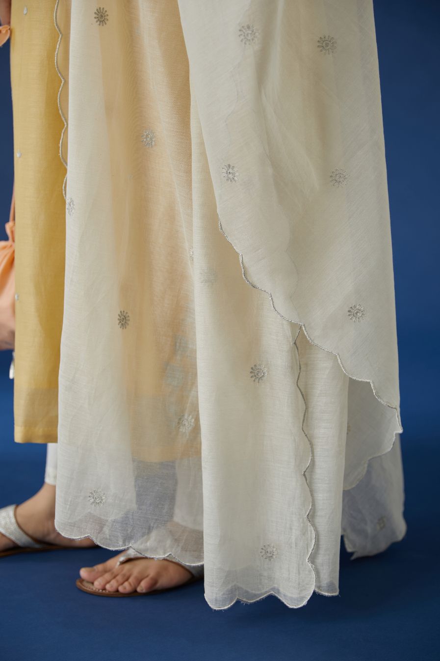 Off white cotton Chanderi dupatta with all-over silver zari embroidery and scalloped edges (Dupatta)