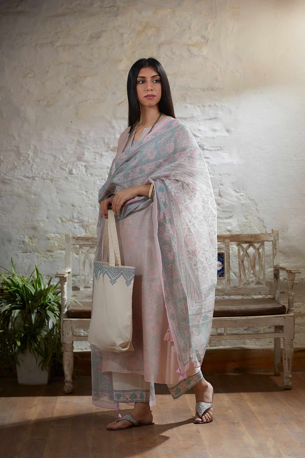 Pink embroidered straight kurta set with tying cord at waist sides and printed slip