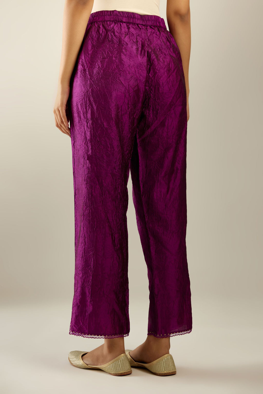 Sangria hand crushed silk straight pants with scalloped and embroidered organza at edges and detailed with a single line of sequins at hem