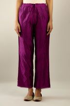 Sangria hand crushed silk straight pants with scalloped and embroidered organza at edges and detailed with a single line of sequins at hem