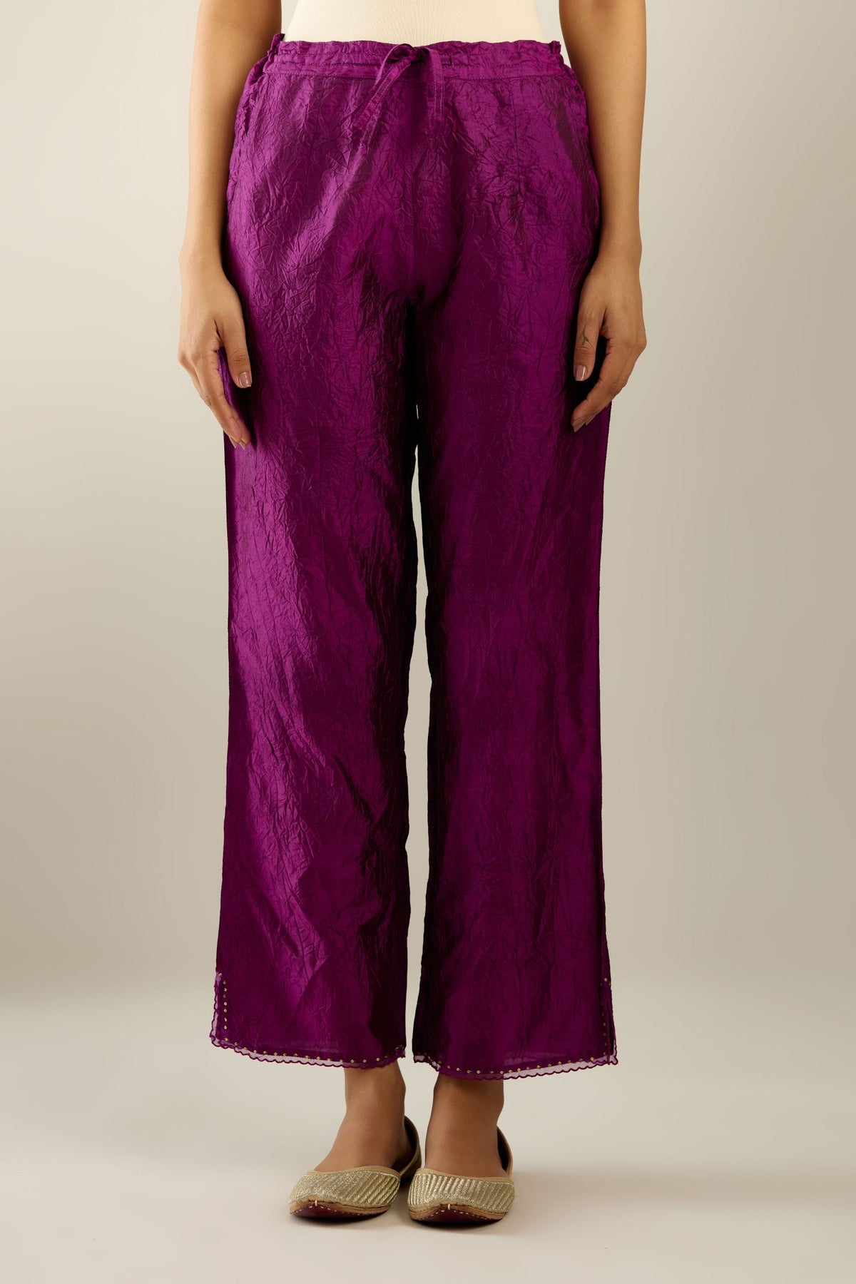 Sangria hand crushed silk straight pants with scalloped and embroidered organza at edges and detailed with a single line of sequins at hem