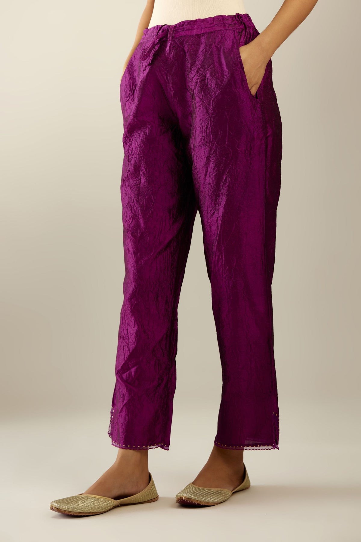 Sangria hand crushed silk straight pants with scalloped and embroidered organza at edges and detailed with a single line of sequins at hem