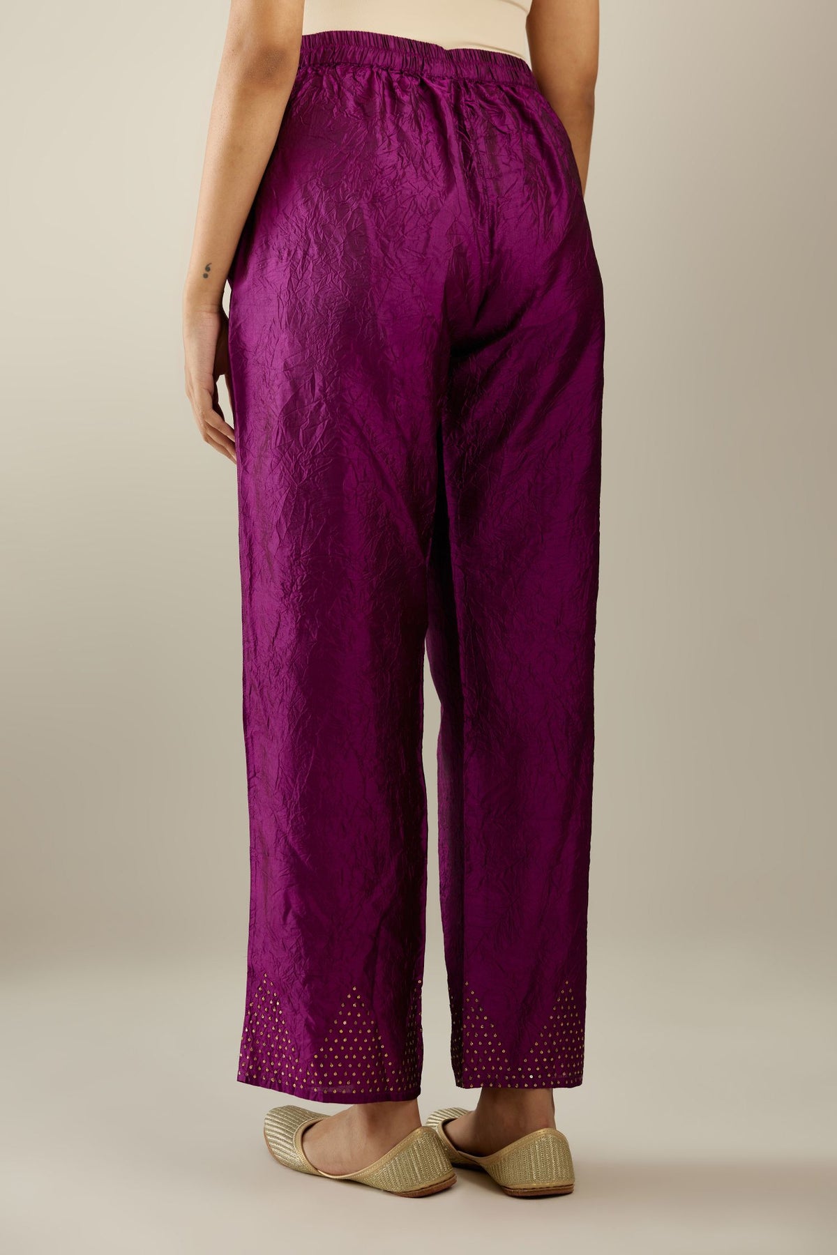 Sangria hand crushed silk straight pants with scalloped and embroidered organza at edges and detailed with a single line of sequins at hem