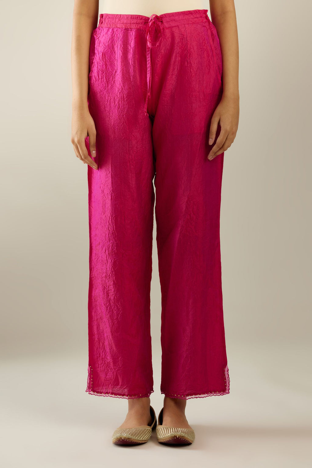Jazzberry jam hand crushed silk straight pants with scalloped and embroidered organza at edges and detailed with a single line of sequins at hem