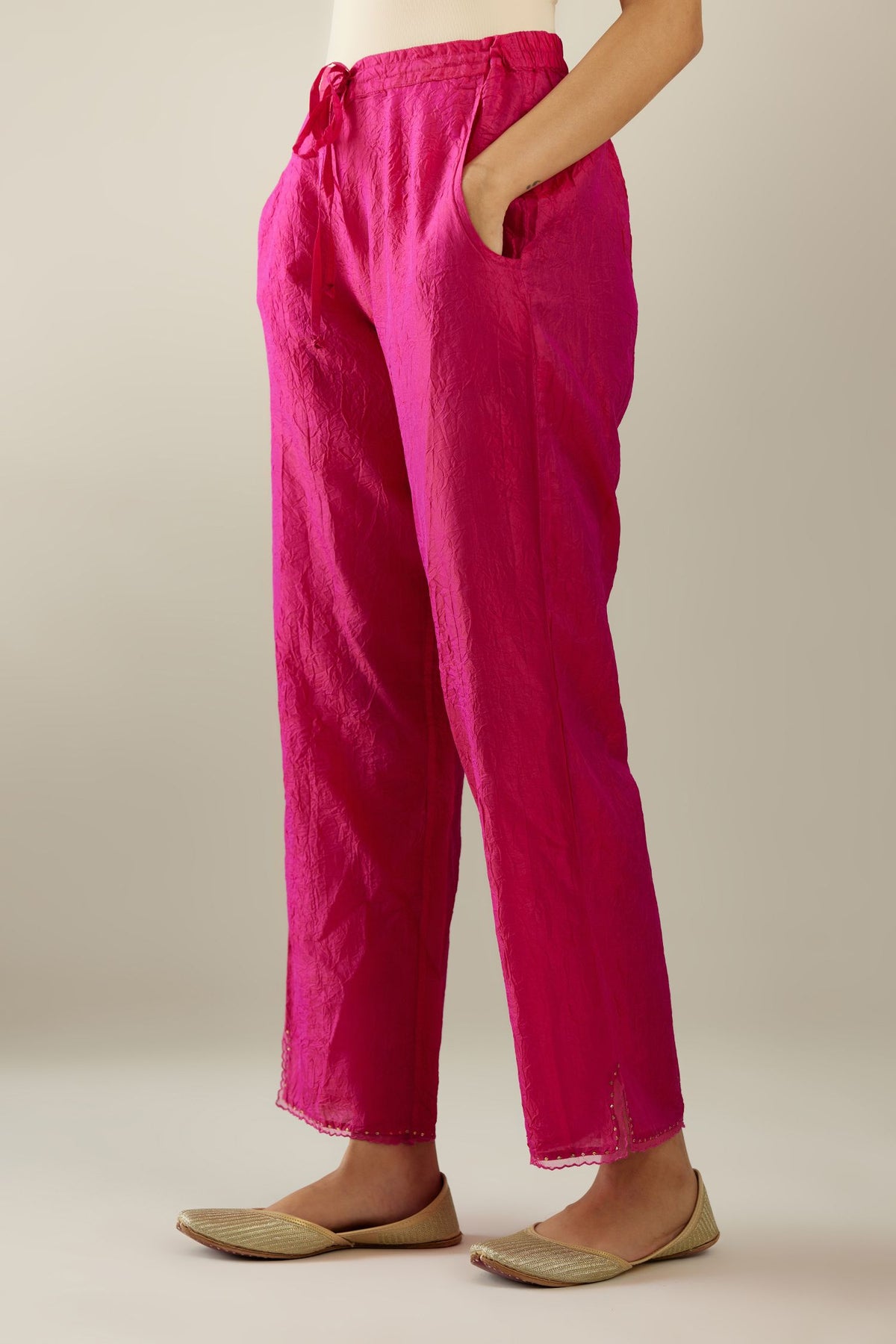 Jazzberry jam hand crushed silk straight pants with scalloped and embroidered organza at edges and detailed with a single line of sequins at hem