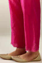 Jazzberry jam hand crushed silk straight pants with scalloped and embroidered organza at edges and detailed with a single line of sequins at hem