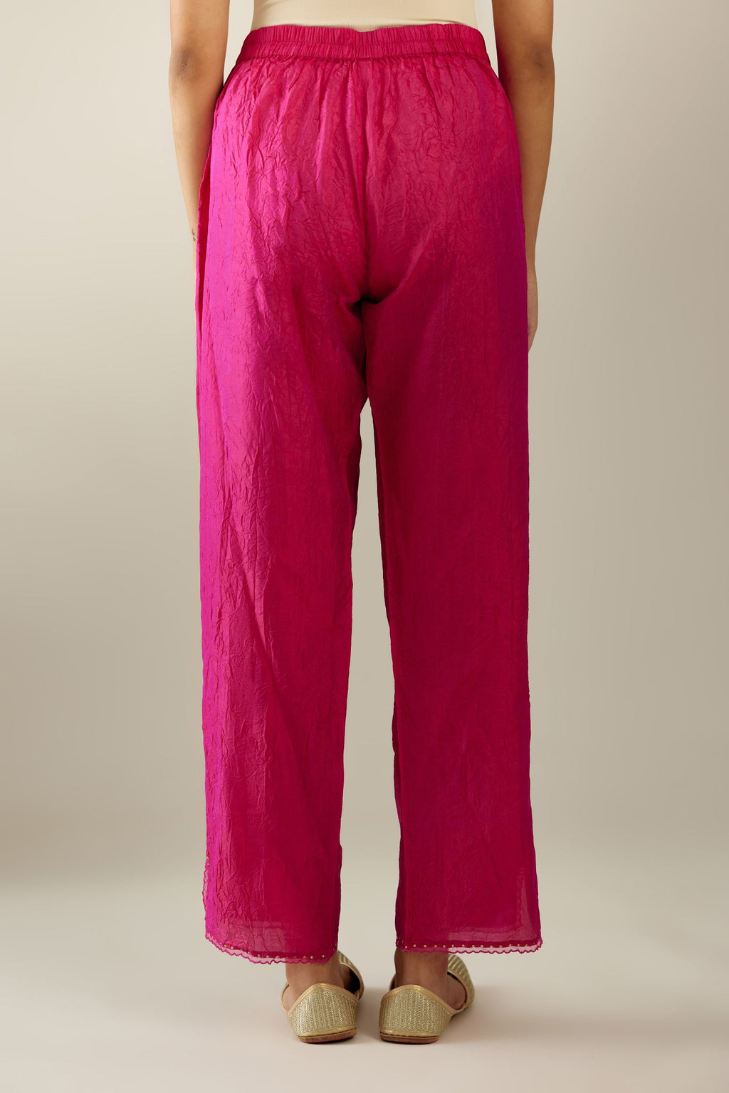 Jazzberry jam hand crushed silk straight pants with scalloped and embroidered organza at edges and detailed with a single line of sequins at hem