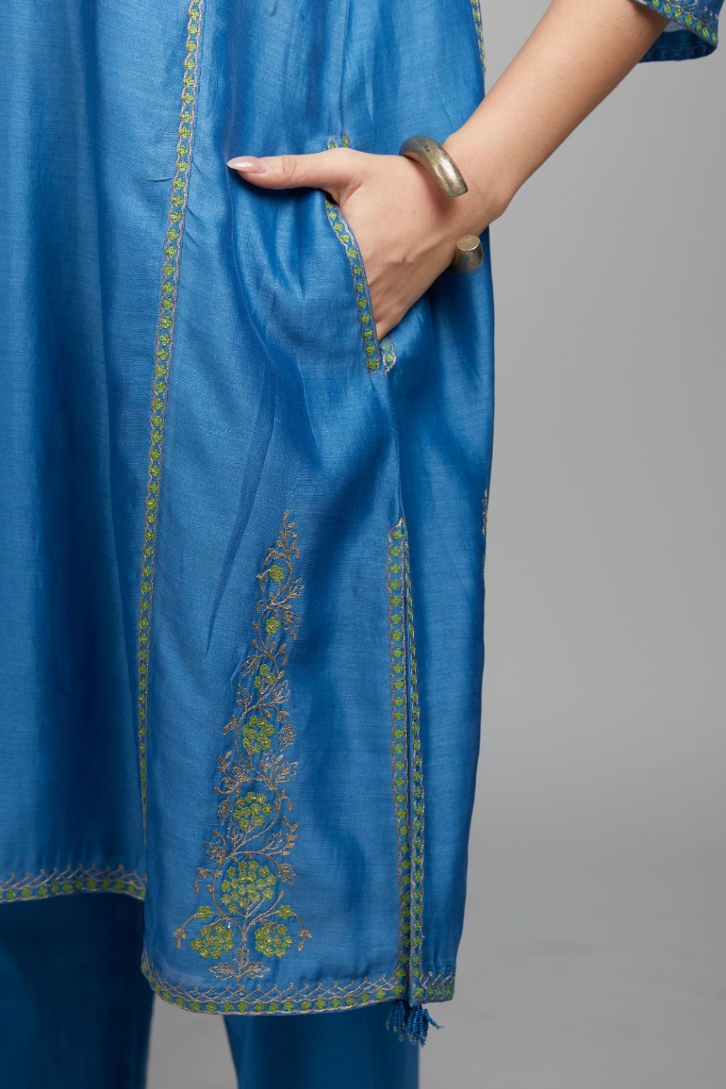 Blue short kalidar kurta set, highlighted with delicate contrast coloured embroidery