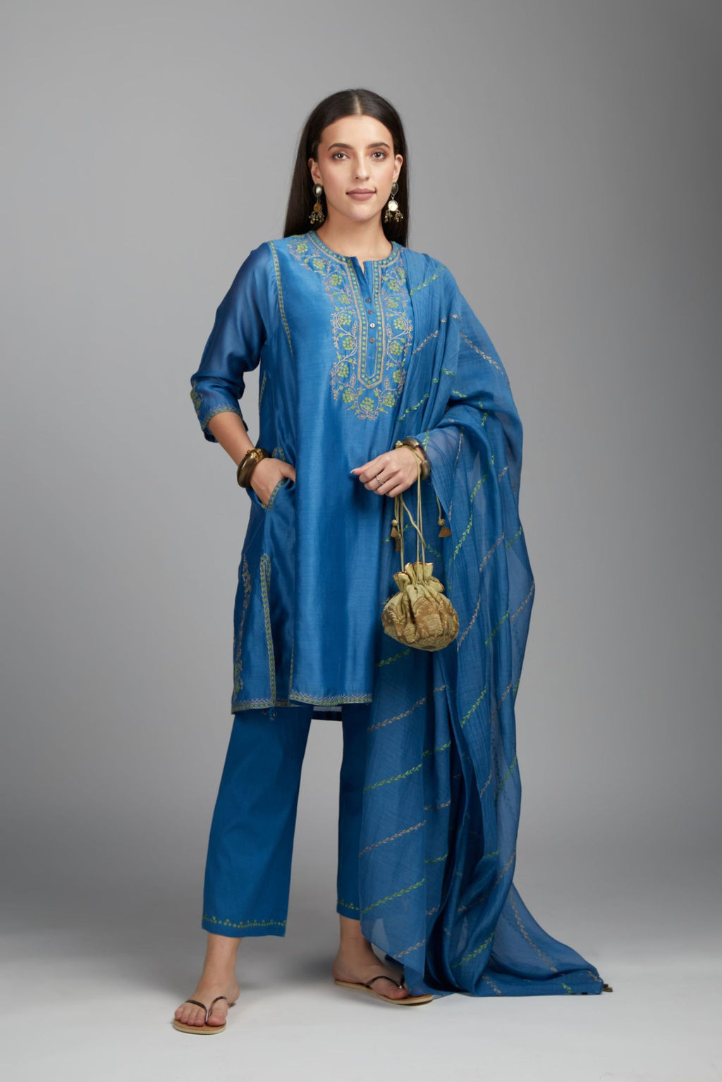 Blue short kalidar kurta set, highlighted with delicate contrast coloured embroidery
