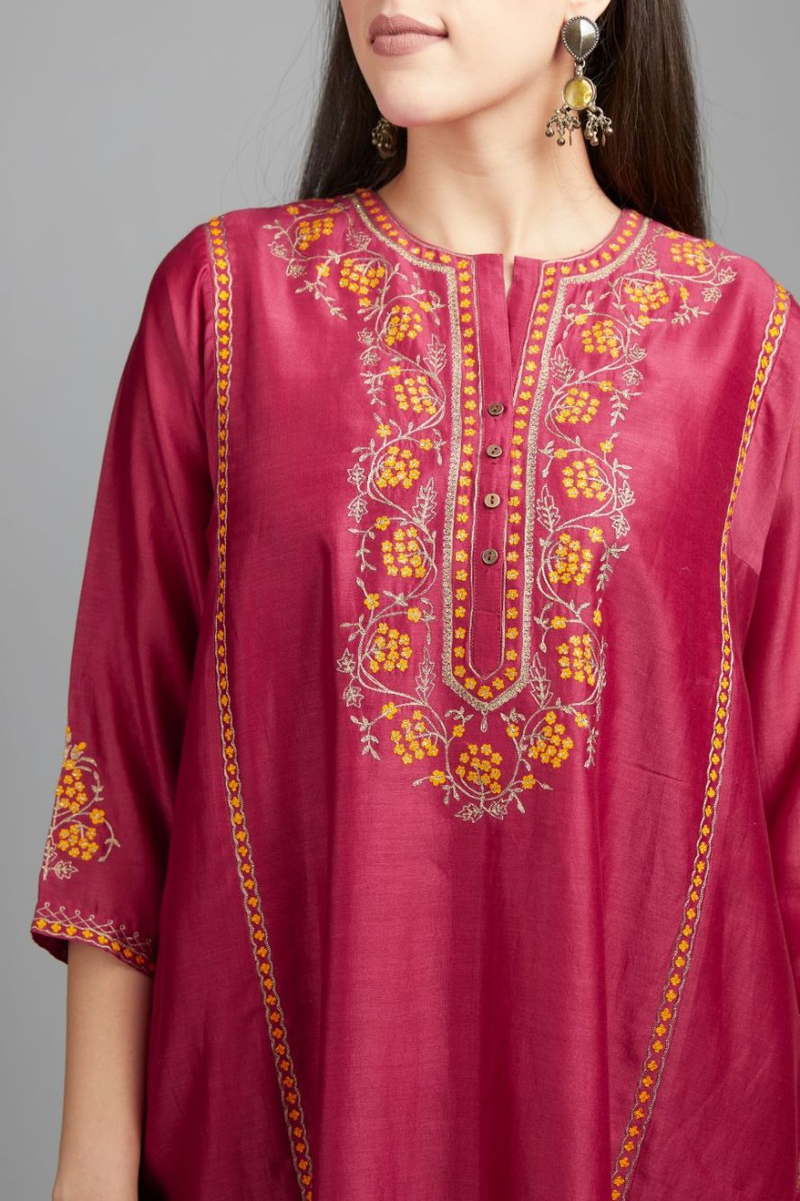 Deep wine short kalidar kurta set, highlighted with delicate contrast coloured embroidery