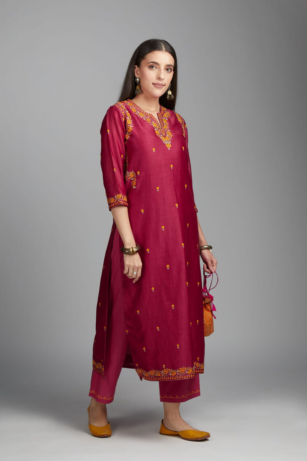Deep wine straight kurta set, highlighted with all-over delicate contrast coloured embroidery